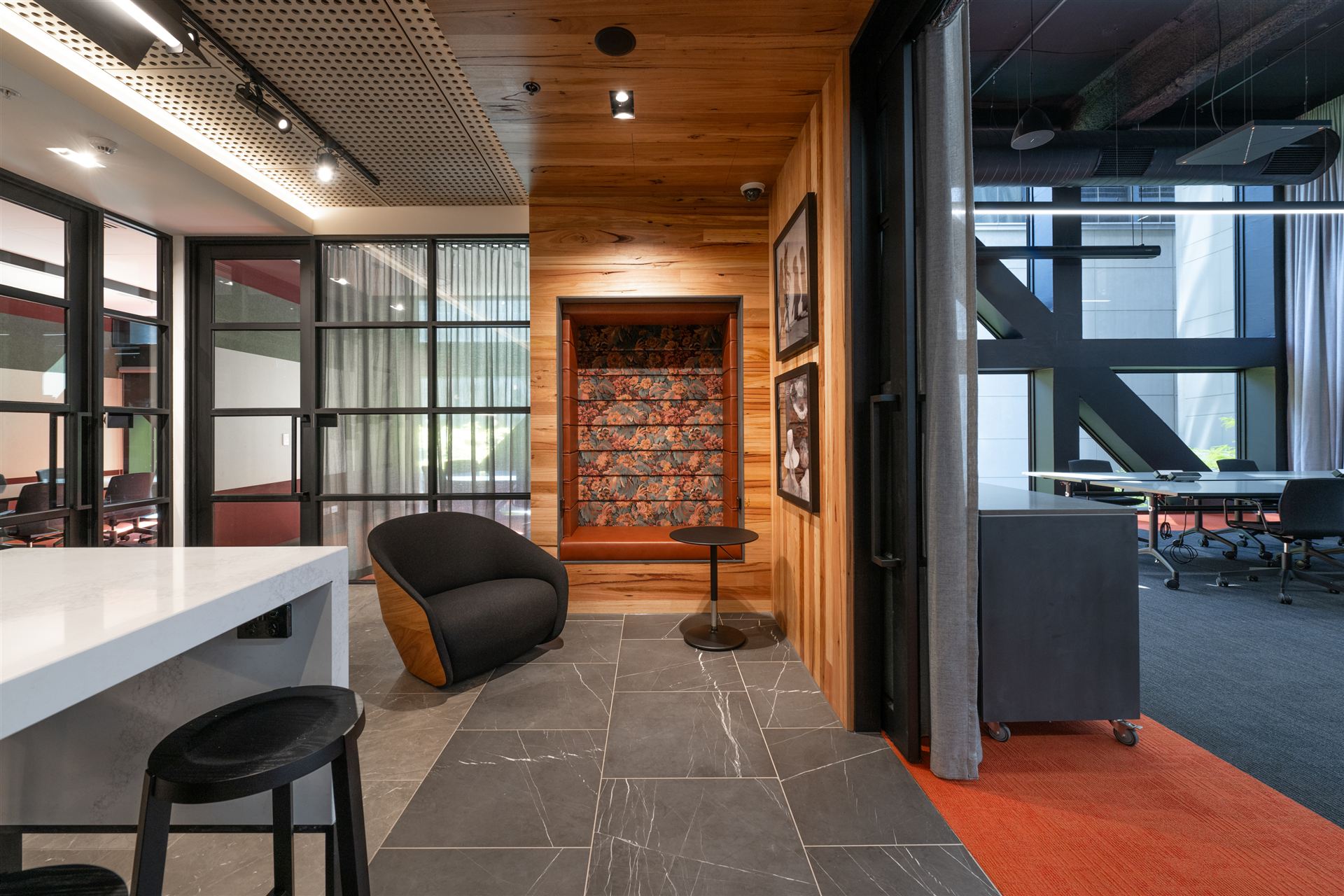 Level 5 third space — lounge nook with timber ceiling