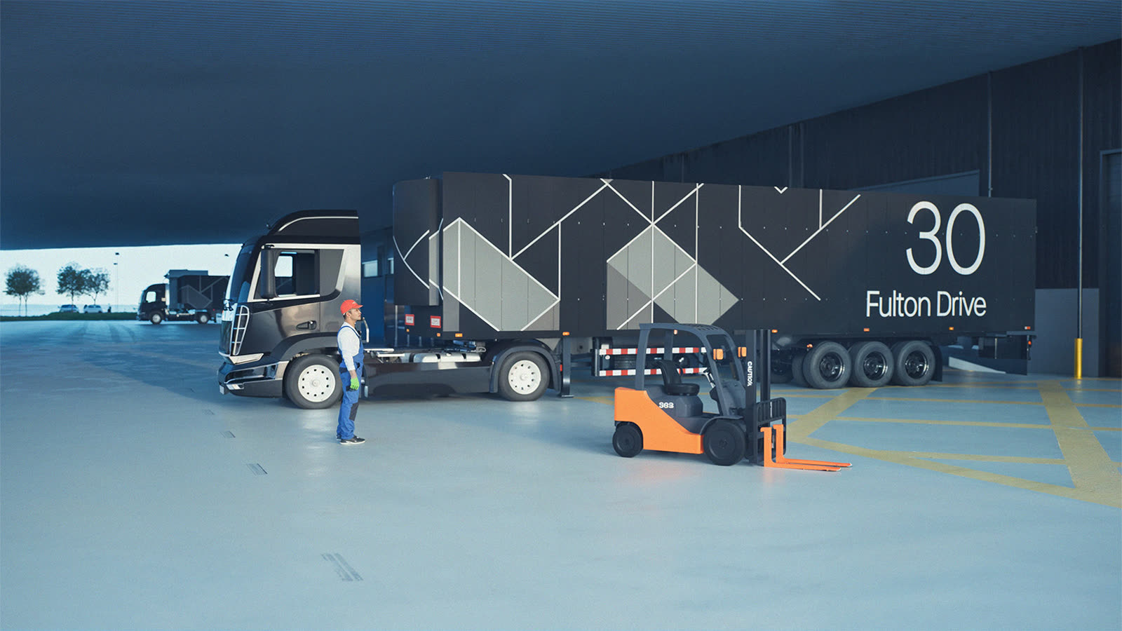 Under the 35 metre supercanopy — a branded B-double and forklift working the hardstand